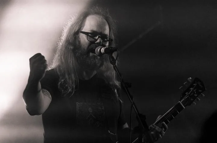 Doomherre live performance, dark stage lighting